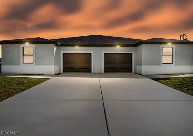 Photo 1 of Multi family home for sale at 438/440 Charwood Ave S, Lehigh Acres, FL 33974 | MLS# 2026010454 | Listing updated on 2026-08-24
