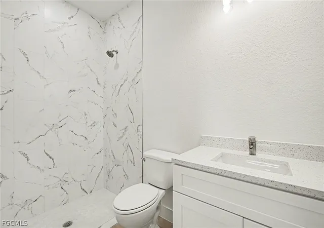 Listing Photo 5 - Condo for sale in building located at 438/440 Charwood Ave S, Lehigh Acres, FL 33974