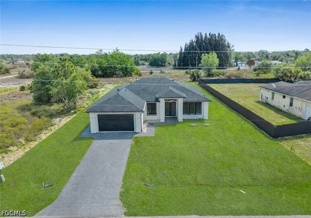 Photo 1 of Single family home for sale at 1618 Moore Ave, Lehigh Acres, FL 33972 | MLS# 2026014650 | Listing updated on 2026-08-20