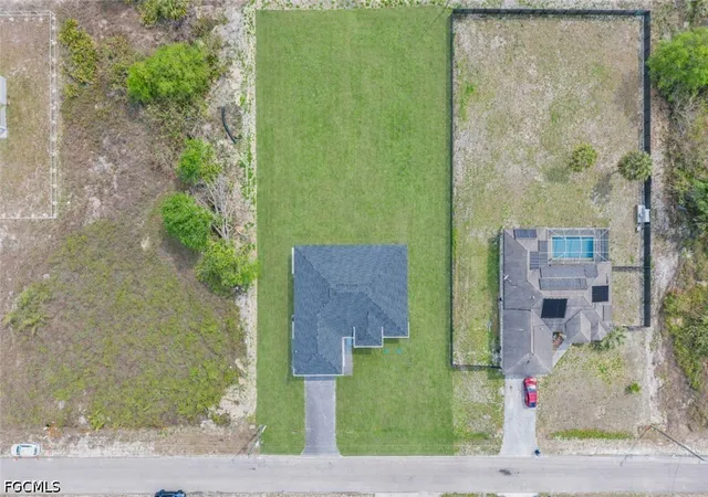 Photo 2 of Single family home for sale at 1618 Moore Ave, Lehigh Acres, FL 33972 | MLS# 2026014650 | Listing updated on 2026-08-20