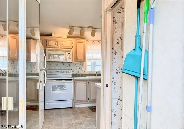 Photo 2 of Manufactured home for sale at 2 Jade Dr #2J, Naples, FL 34114 | MLS# 226013161 | Listing updated on 2026-08-26