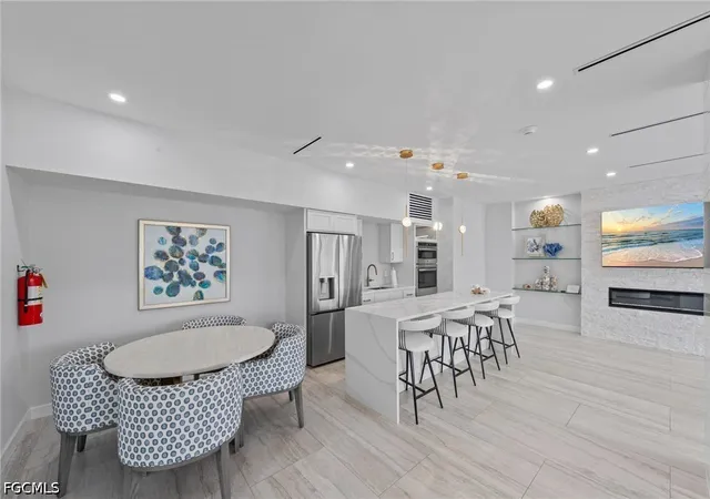 Listing Photo 5 - Condo for sale in building located at 1 Bluebill Ave, Naples, FL 34108 - Unit #402