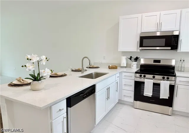 Listing Photo 5 - Condo for sale in building located at 496-498 Bell Blvd S, Lehigh Acres, FL 33974