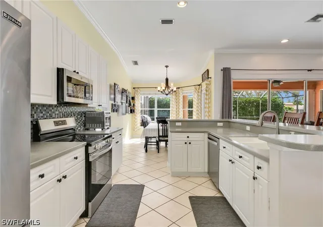 Photo 4 of Single family home for sale at 14484 Jekyll Is Ct, Naples, FL 34119 | MLS# 226014344 | Listing updated on 2026-08-30