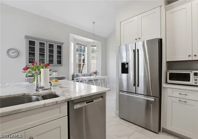 Photo 1 of Townhouse for sale at 14811 Sterling Oaks Dr, Naples, FL 34110 | MLS# 226016047 | Listing updated on 2026-08-15