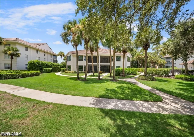 Listing Photo 2 - Condo for sale in building located at 792 Eagle Creek Dr, Naples, FL 34113 - Unit #101