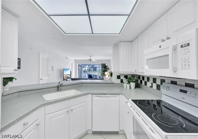 Listing Photo 5 - Condo for sale in building located at 774 Wiggins Lake Dr, Naples, FL 34110 - Unit #101