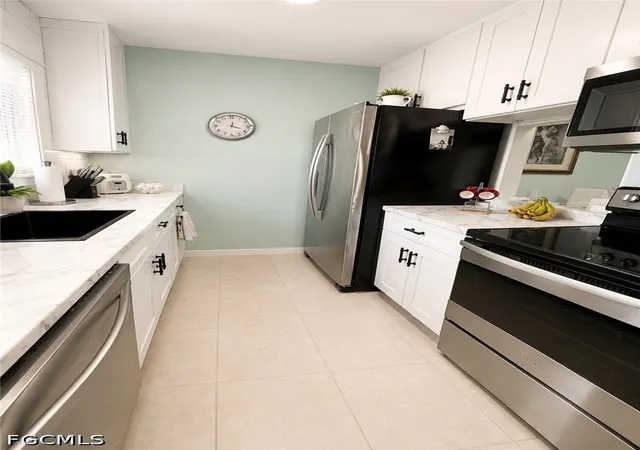 Photo 3 of Townhouse for sale at 748 Joel Blvd, Lehigh Acres, FL 33936 | MLS# 2026021179 | Listing updated on 2026-08-18