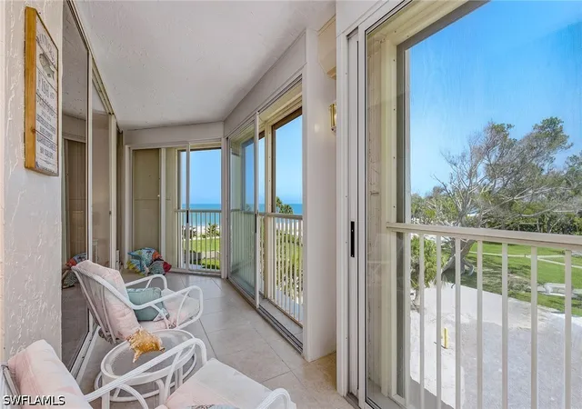 Listing Photo 3 - Condo for sale in building located at 4051 Gulf Shore Blvd N, Naples, FL 34103 - Unit #300