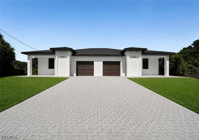 Photo 1 of Sale Pending at 306 / 308 Bell Blvd S, Lehigh Acres, FL 33974 | MLS# 2026022449 | Listing updated on 2026-08-21