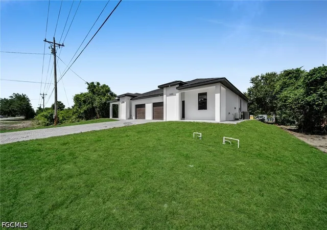 Photo 2 of Sale Pending at 306 / 308 Bell Blvd S, Lehigh Acres, FL 33974 | MLS# 2026022449 | Listing updated on 2026-08-21