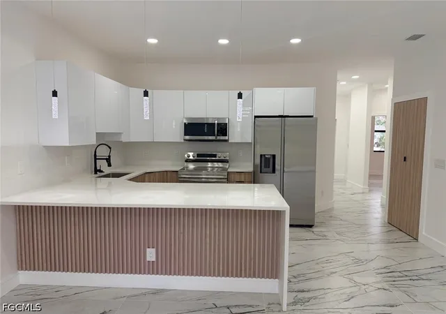 Listing Photo 5 - Condo for sale in building located at 330 / 332 Bell Blvd S, Lehigh Acres, FL 33974