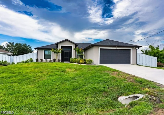 Photo 1 of Single family home for sale at 1028 Champion Ave, Lehigh Acres, FL 33971 | MLS# 2026022689 | Listing updated on 2026-08-14