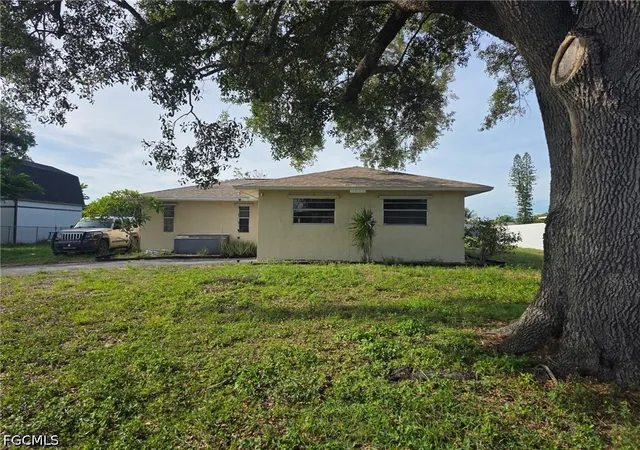 1st image of 1434 Caywood Cir N, Lehigh Acres, FL 33936 | MLS# 2026025471