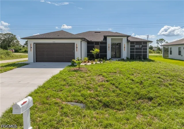 1st image of 816 Floyd Ave S, Lehigh Acres, FL 33976 | MLS# 2026026684
