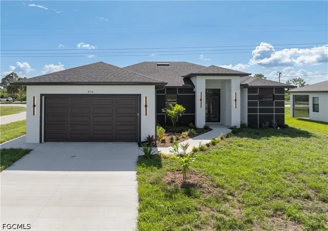 2nd image of 816 Floyd Ave S, Lehigh Acres, FL 33976 | MLS# 2026026684