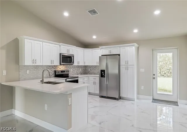 Photo 2 of Single family home for sale at 128 Sanborn Dr, Lehigh Acres, FL 33972 | MLS# 2026026715 | Listing updated on 2026-08-18