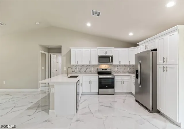 Photo 3 of Single family home for sale at 128 Sanborn Dr, Lehigh Acres, FL 33972 | MLS# 2026026715 | Listing updated on 2026-08-18