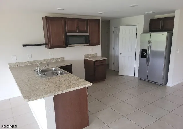 Photo 3 of Sale Pending at 3303 75th Street W, Lehigh Acres, FL 33971 | MLS# 2026026802 | Listing updated on 2026-09-29