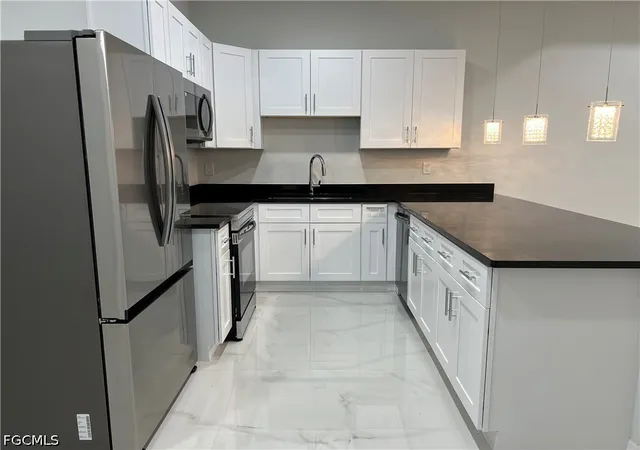 Photo 2 of Multi family home for sale at 2641/2643 Sunniland Blvd, Lehigh Acres, FL 33971 | MLS# 2026027225 | Listing updated on 2026-08-26