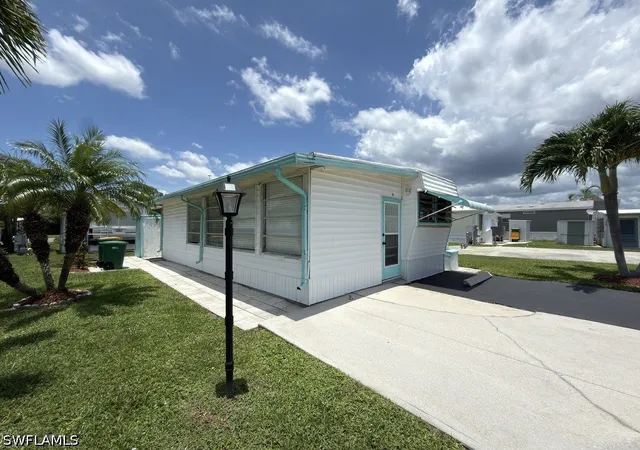Photo 2 of Manufactured home for sale at 16 Jade Dr, Naples, FL 34114 | MLS# 226024552 | Listing updated on 2026-08-26