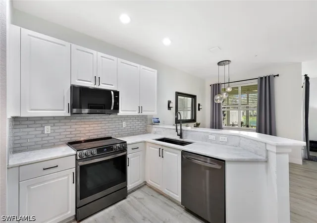 Photo 1 of Townhouse for sale at 1430 Mariposa Cir #102, Naples, FL 34105 | MLS# 226024599 | Listing updated on 2026-08-18