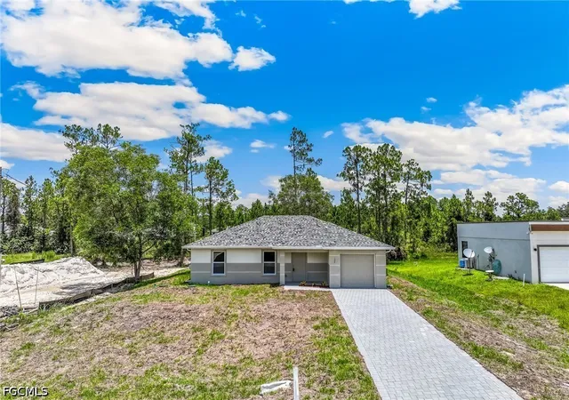 Photo 2 of Single family home for sale at 134 Greenbriar Blvd, Lehigh Acres, FL 33972 | MLS# 2026028893 | Listing updated on 2026-08-18