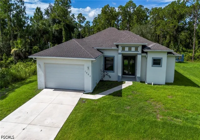 Photo 2 of Single family home for sale at 1002 E 5th Street, Lehigh Acres, FL 33972 | MLS# 2026029095 | Listing updated on 2026-08-20