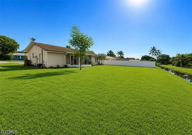 Photo 2 of Sale Pending at 406 Parkside St, Lehigh Acres, FL 33936 | MLS# 2026029166 | Listing updated on 2026-08-14