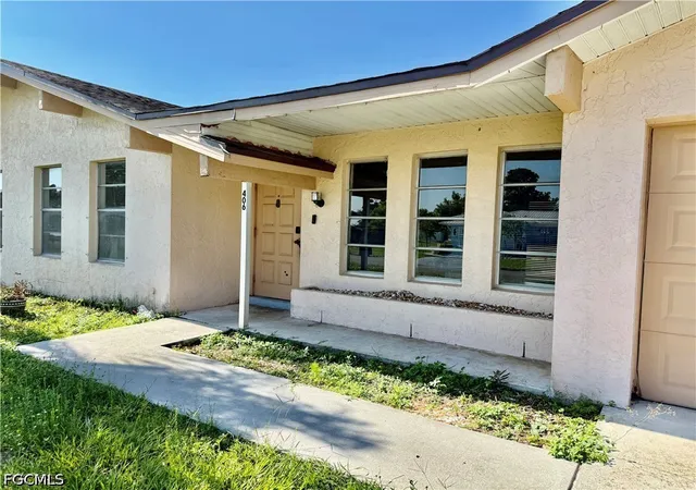 Photo 2 of Sale Pending at 406 Parkside St, Lehigh Acres, FL 33936 | MLS# 2026029166 | Listing updated on 2026-08-14
