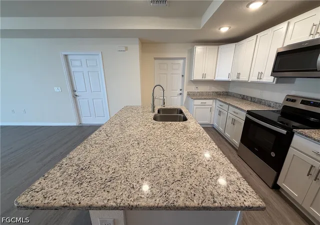 Photo 4 of Single family home for sale at 557 Oakshire Ln, Lehigh Acres, FL 33972 | MLS# 2026029266 | Listing updated on 2026-08-28