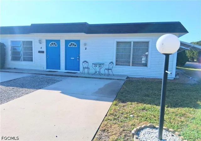 Photo 2 of Townhouse for sale at 2 Tangelo Ct, Lehigh Acres, FL 33936 | MLS# 2026029464 | Listing updated on 2026-08-26