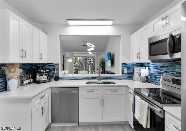 Listing Photo 5 - Condo for sale in building located at 653 Squire Cir, Naples, FL 34104 - Unit #201