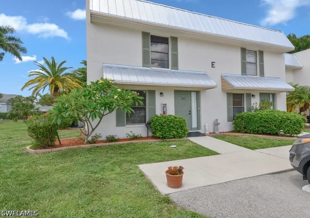 Photo 1 of Townhouse for sale at 151 Cypress Way E #E101, Naples, FL 34110 | MLS# 226025807 | Listing updated on 2026-08-19