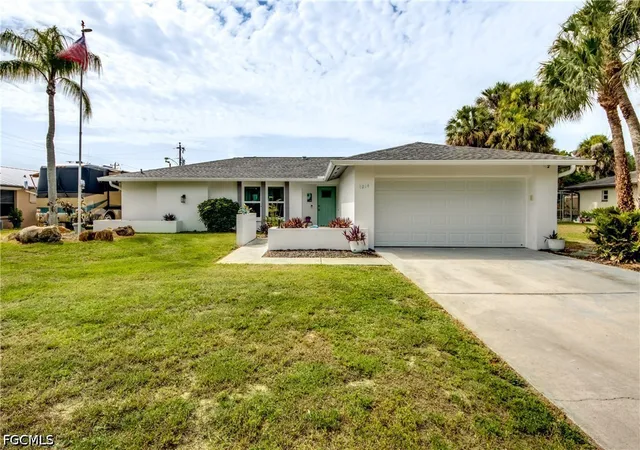 Photo 1 of Single family home for sale at 1214 Baldwin Pl, Lehigh Acres, FL 33936 | MLS# 2026030051 | Listing updated on 2026-10-06