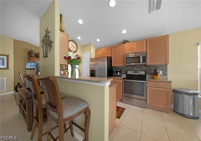 Photo 3 of Single family home for sale at 2457 Anguilla Dr, Cape Coral, FL 33991 | MLS# 2026030064 | Listing updated on 2026-08-26