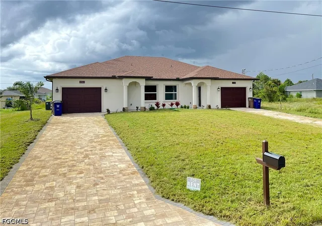 Photo 1 of Multi family home for sale at 1520/1522 Gretchen Ave S, Lehigh Acres, FL 33973 | MLS# 2026030246 | Listing updated on 2026-08-26