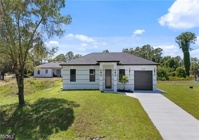 Photo 1 of Sale Pending at 320 Long Ave S, Lehigh Acres, FL 33974 | MLS# 2026030559 | Listing updated on 2026-08-30
