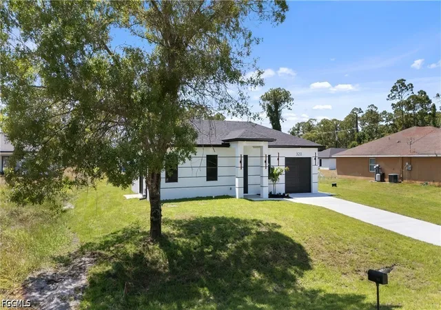 Photo 2 of Sale Pending at 320 Long Ave S, Lehigh Acres, FL 33974 | MLS# 2026030559 | Listing updated on 2026-08-30