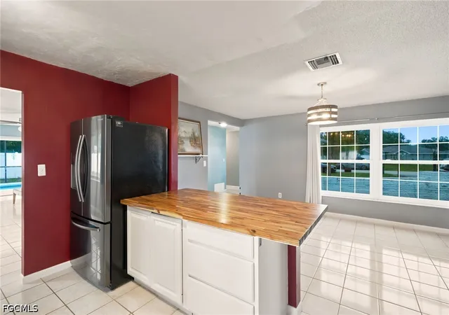 Photo 2 of Single family home for sale at 301 Hollywood St, Lehigh Acres, FL 33936 | MLS# 2026030561 | Listing updated on 2026-08-16
