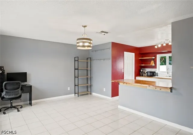 Photo 3 of Single family home for sale at 301 Hollywood St, Lehigh Acres, FL 33936 | MLS# 2026030561 | Listing updated on 2026-08-16
