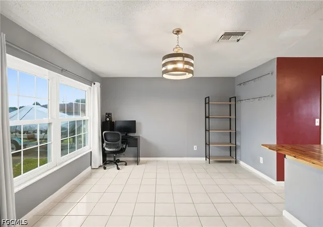 Photo 4 of Single family home for sale at 301 Hollywood St, Lehigh Acres, FL 33936 | MLS# 2026030561 | Listing updated on 2026-08-16
