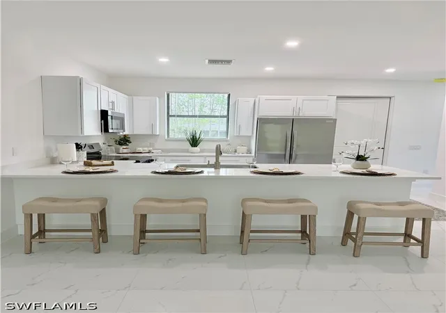Multi family home for sale at 303 Norwalk Ave, Lehigh Acres, FL 33972 | MLS# 226024493