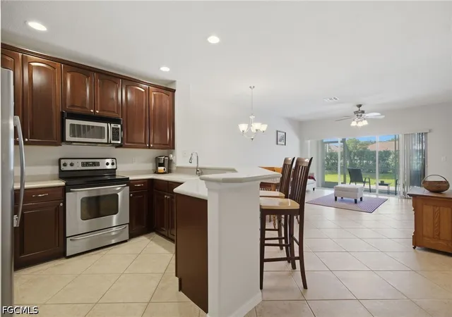 Photo 3 of Townhouse for sale at 10088 Pacific Pines Ave, Fort Myers, FL 33966 | MLS# 2026031194 | Listing updated on 2026-08-18