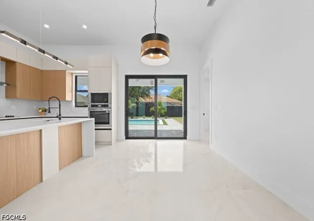 Photo 3 of Sale Pending at 306 Ne 11th Street, Cape Coral, FL 33909 | MLS# 2026031838 | Listing updated on 2026-08-20