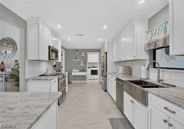 Photo 2 of Single family home for sale at 12701 Kelly Palm Dr, Fort Myers, FL 33908 | MLS# 2026031873 | Listing updated on 2026-08-23
