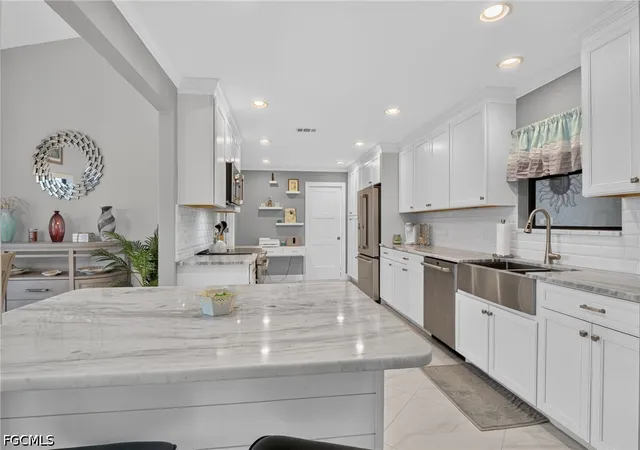 Photo 3 of Single family home for sale at 12701 Kelly Palm Dr, Fort Myers, FL 33908 | MLS# 2026031873 | Listing updated on 2026-08-23