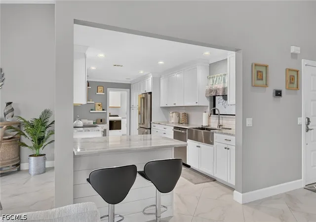 Photo 3 of Sale Pending at 12701 Kelly Palm Dr, Fort Myers, FL 33908 | MLS# 2026031873 | Listing updated on 2026-10-03