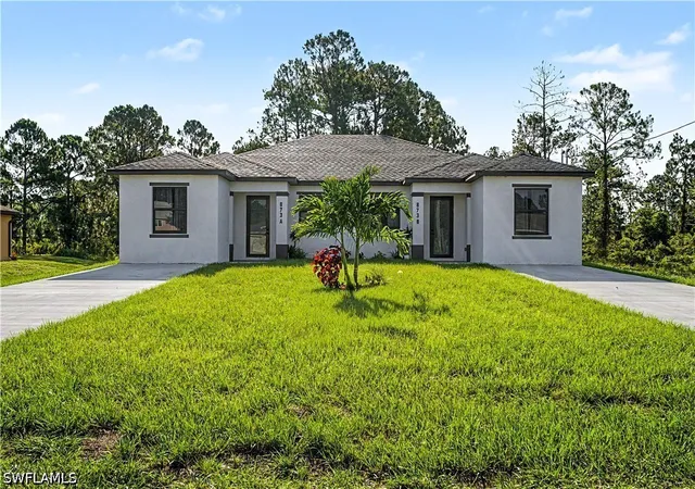 Photo 1 of Multi family home for sale at 873 Eisenhower Blvd, Lehigh Acres, FL 33974 | MLS# 226028264 | Listing updated on 2026-08-30