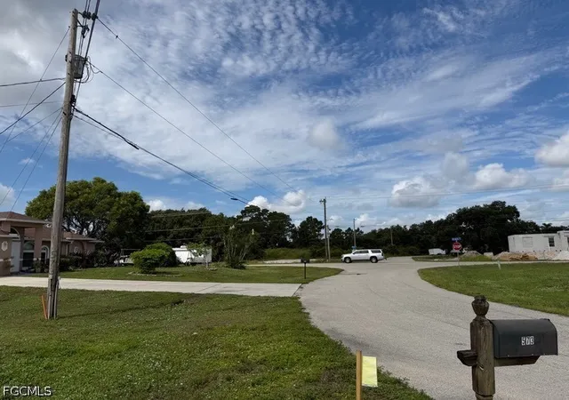 Photo 2 of Sale Pending at 573 Bourse Cir, Lehigh Acres, FL 33974 | MLS# 2026033298 | Listing updated on 2026-08-17